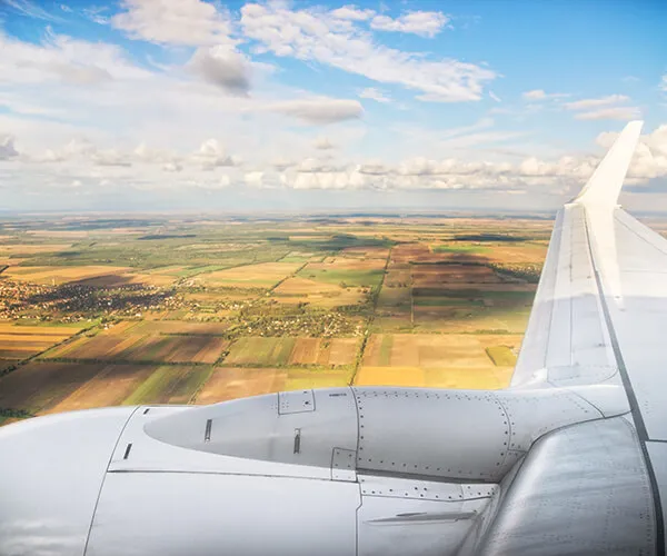 View from airplane window over landscape